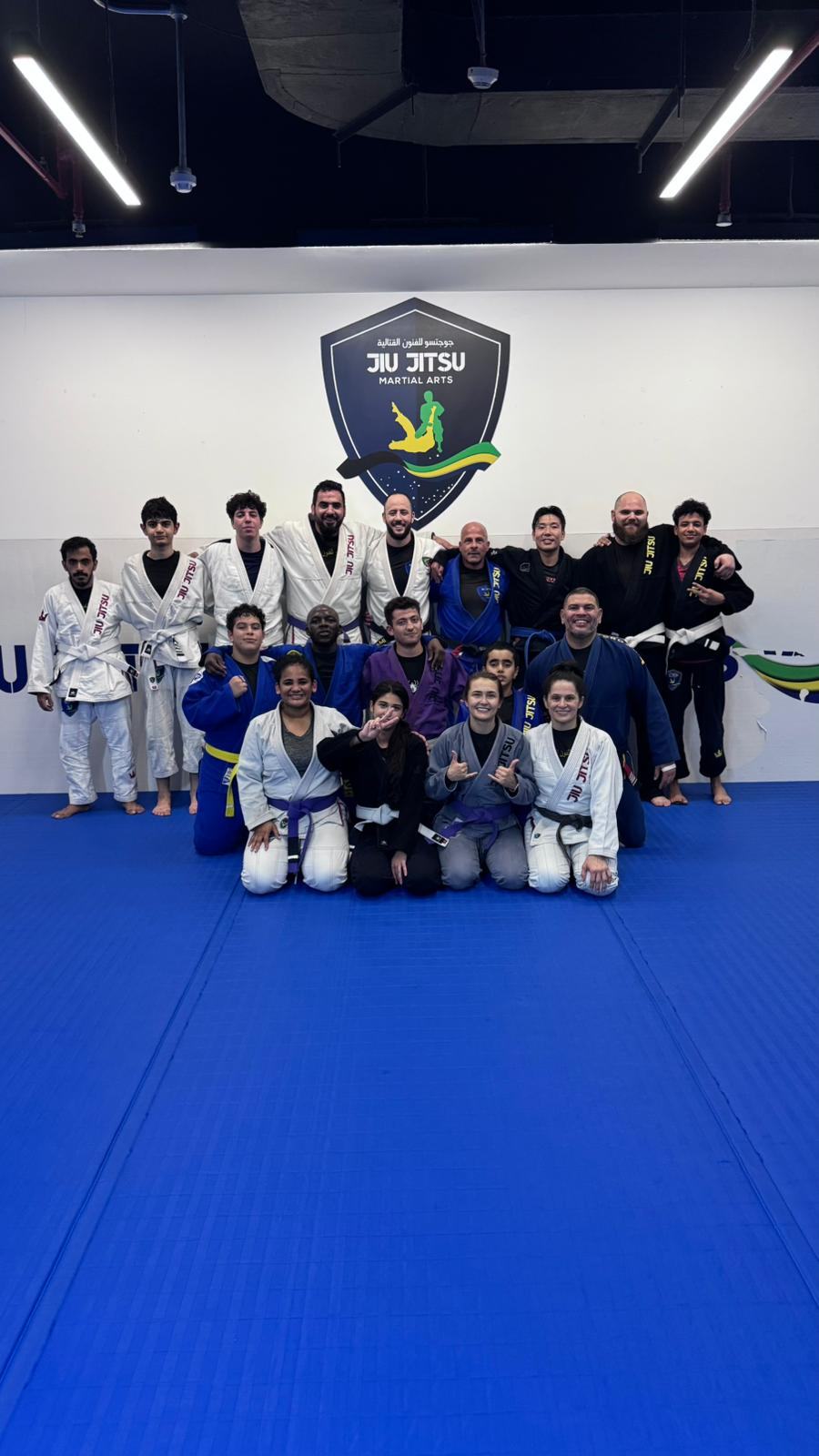 The JJMA Brazilian Jiu Jitsu Qatar team and students together in their Doha academy